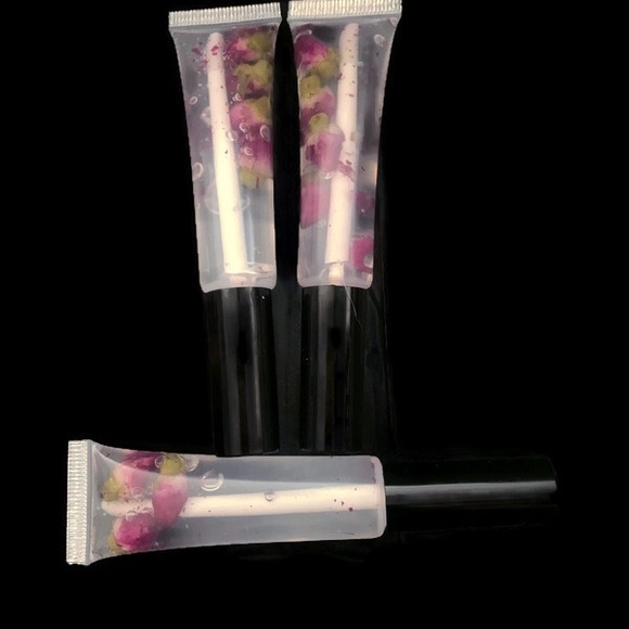 For all 3 /$15  Essentials Lip glosses with rose flower buds - Picture 6 of 8